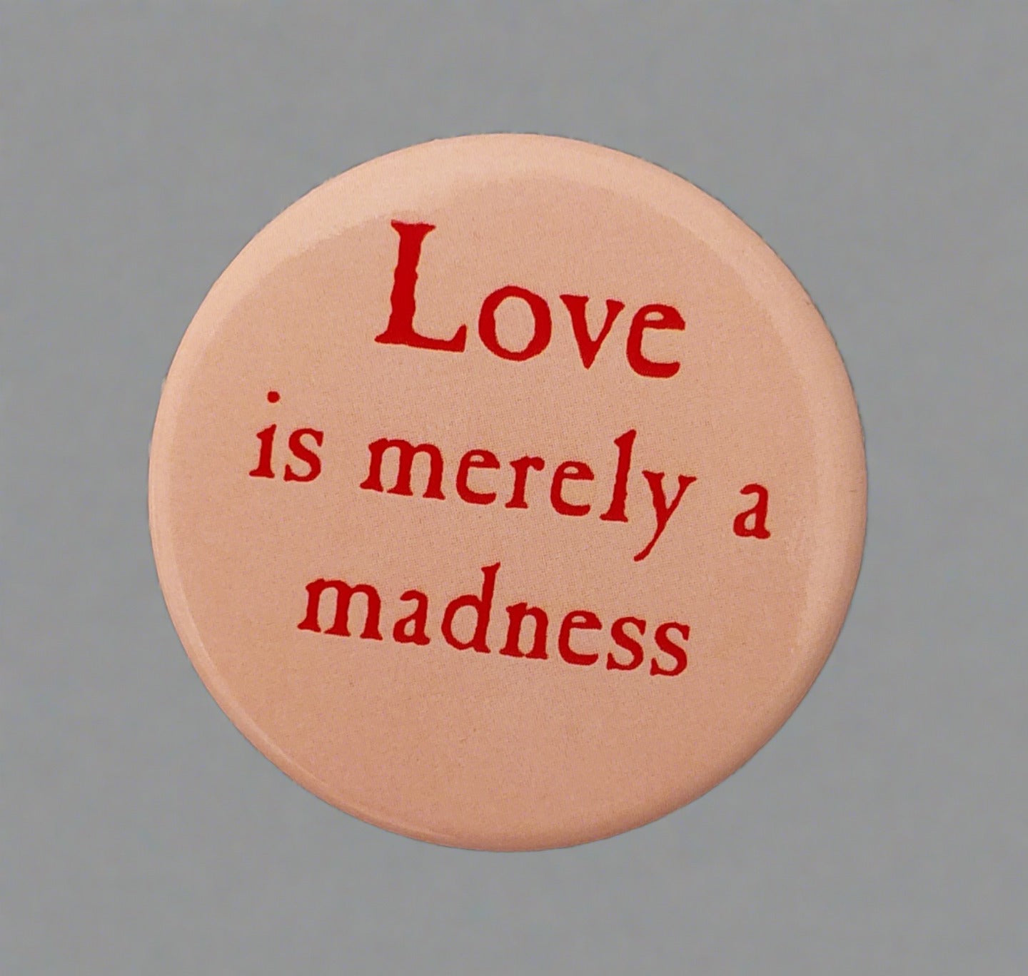 Badge: Love is Merely a Madness
